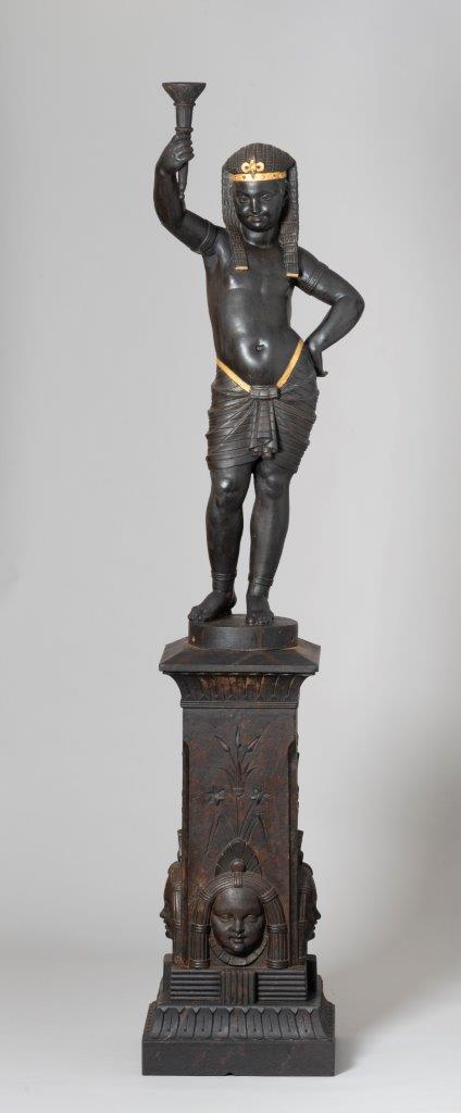 Cast iron figure of a torch bearer representing a Nubian girl in the Napoleon III style from the 19th century; from the Val d'Osne Art Foundry, France.