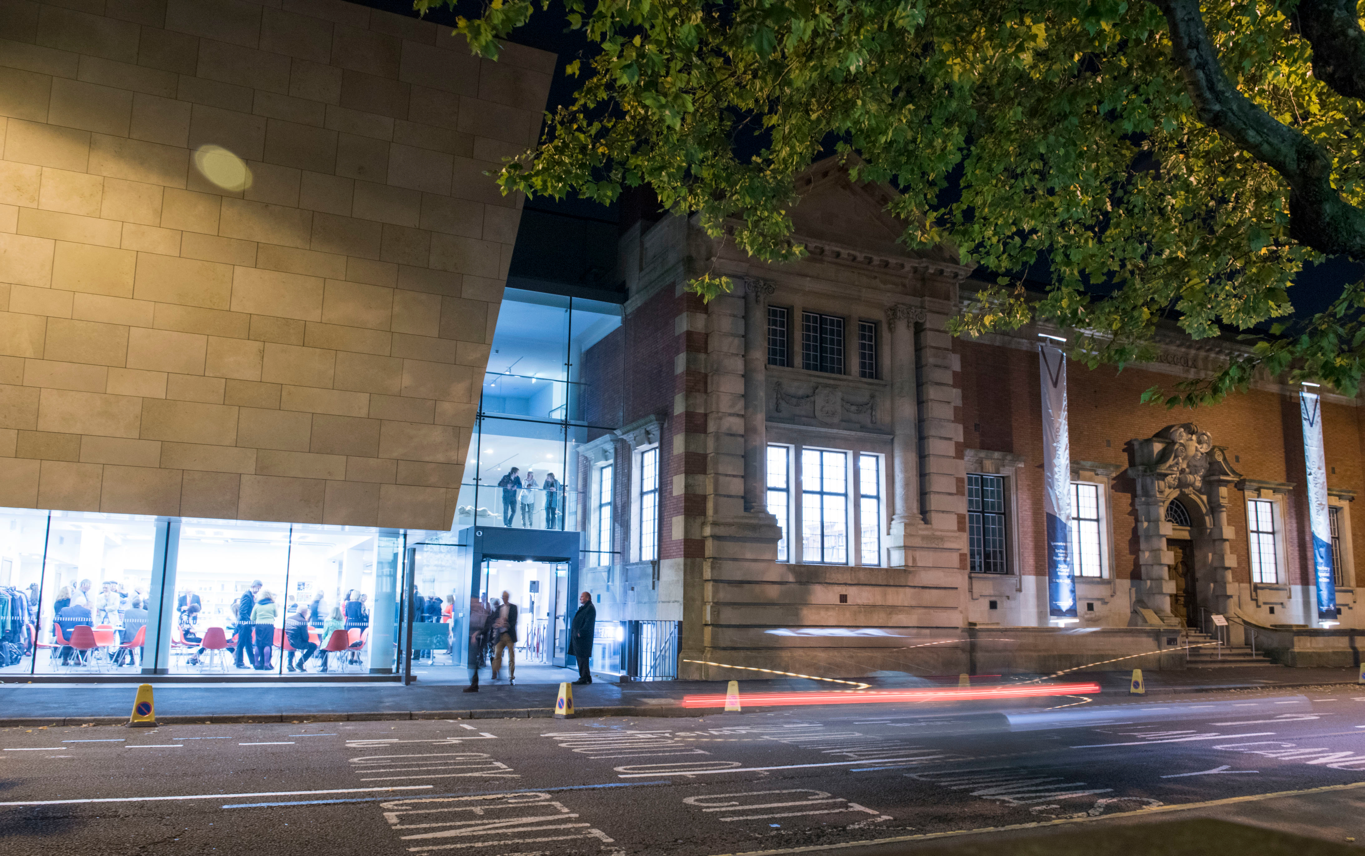 A photograph of the Glynn Vivian Art Gallery from the street, lit up at night 